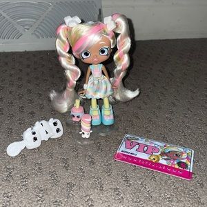 Marsha Mello Shopkin Doll. Comes with brush, VIP card and 2 shopkins.